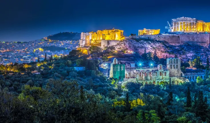 Parthenon and Herodium construction in Acropolis Hill in Athens, Greece shot in blue hou