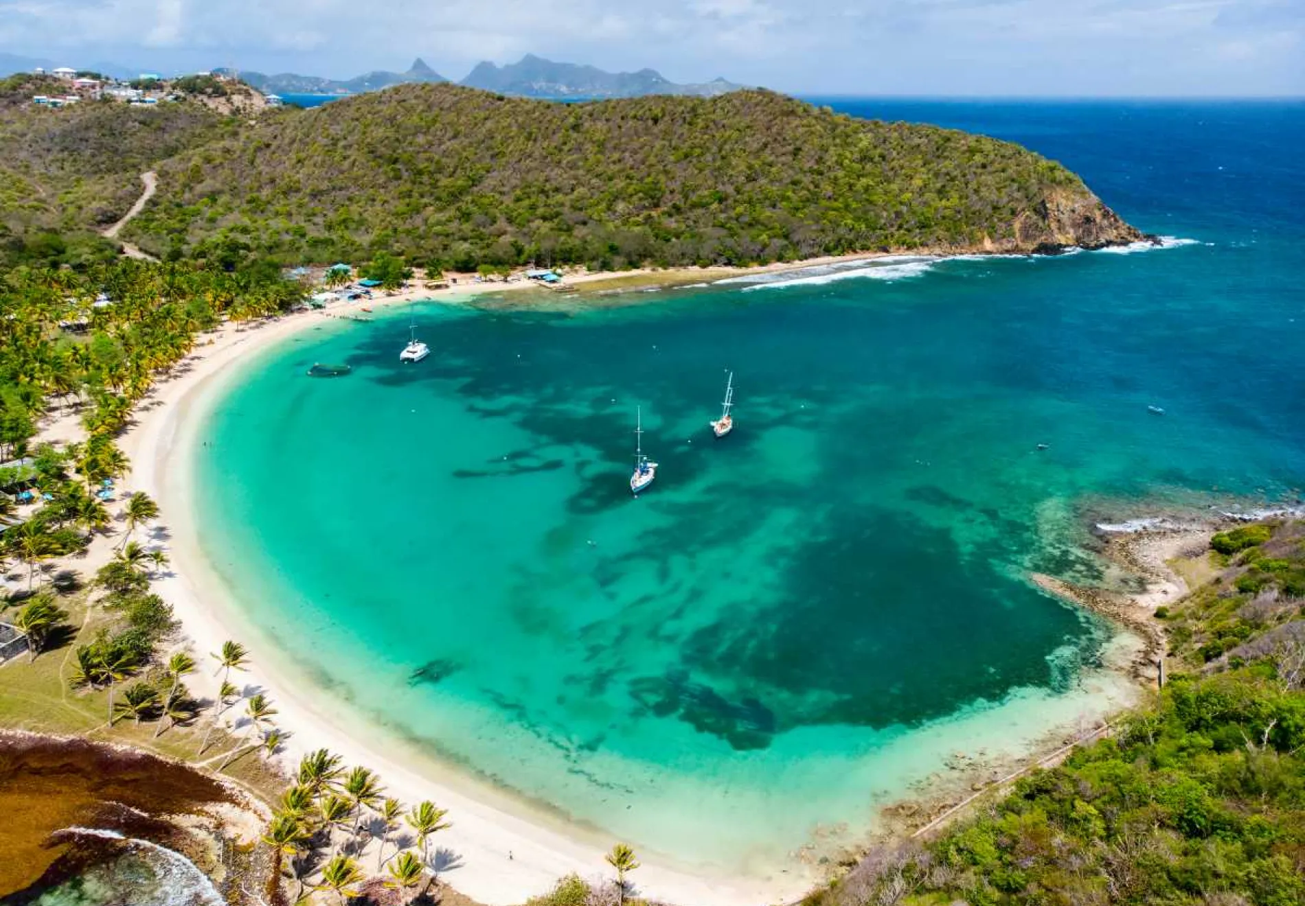 Aerial-drone-view-of-tropical-island-of-Mayreau-and-turquoise