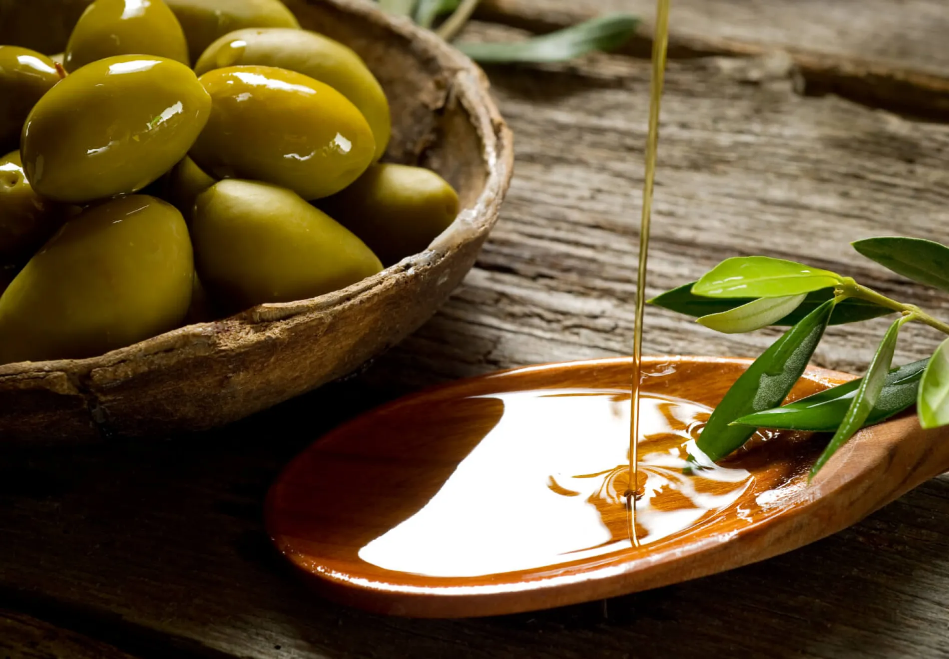 Olive oil over spoon