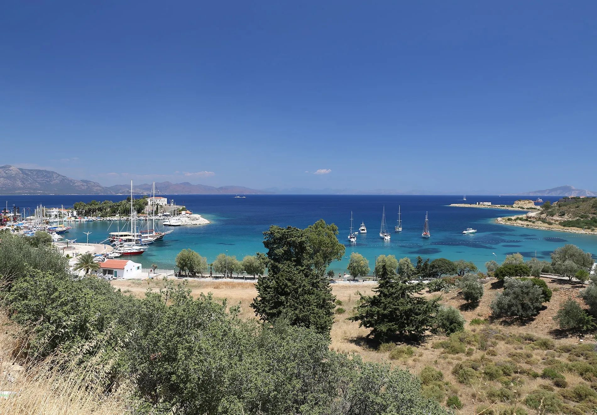 Datça is a charming port town with crystal-clear waters and a laid-back atmosphere