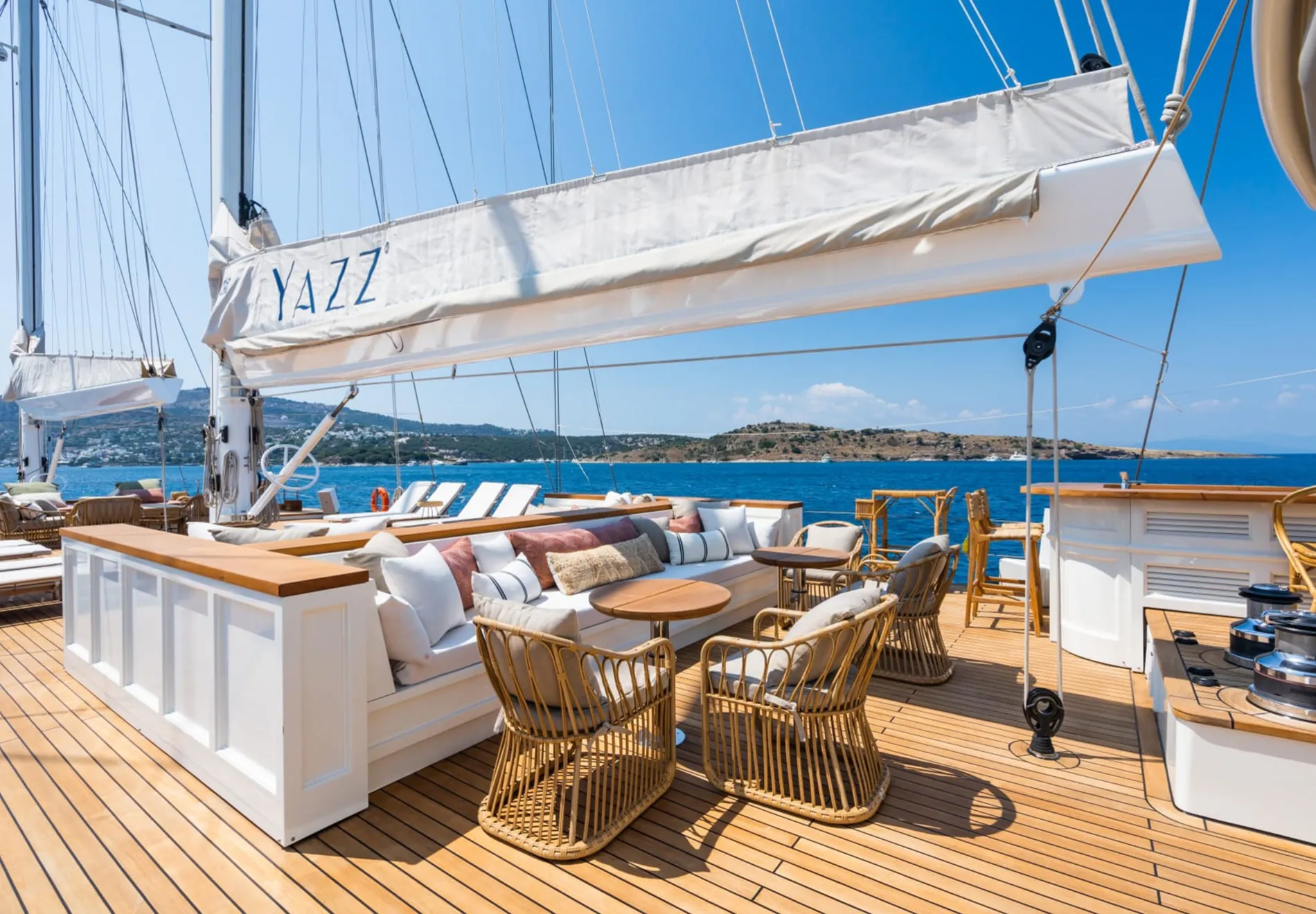 The yacht also offers a shaded main deck dining area with a bar and privacy screens. Accommodating 12 guests with a dedicated crew of