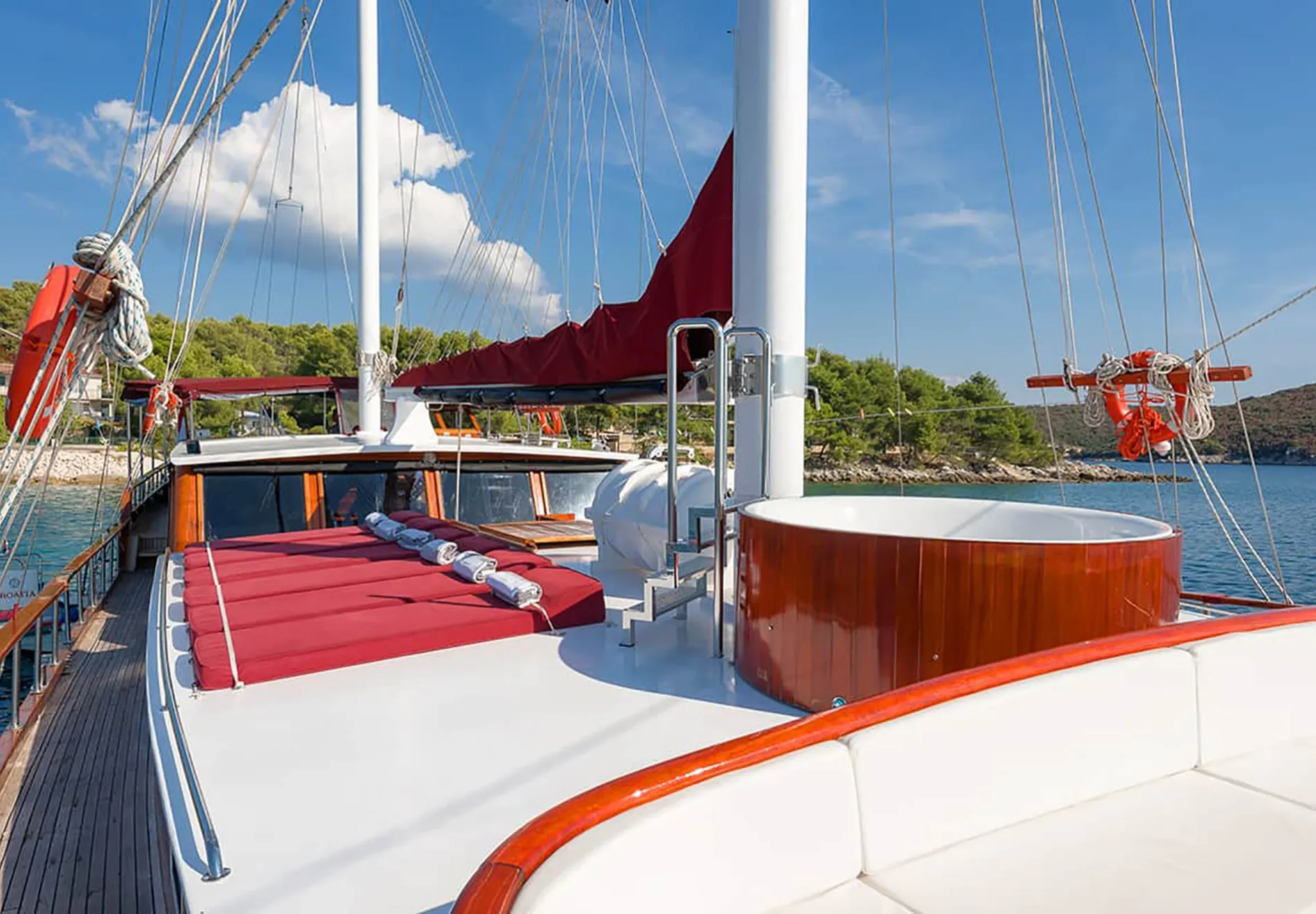 There’s plenty of sun beds for everyone, a shaded area for reading, and a jacuzzi on deck for a relaxing soak after playing with water sports