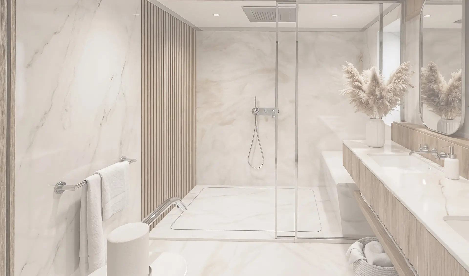 Modern bathroom with marble walls and floor, glass-enclosed shower, rain shower head, wooden slat accent wall, floating vanity with sink, pampas grass in a vase, towels, and soft, neutral lighting.