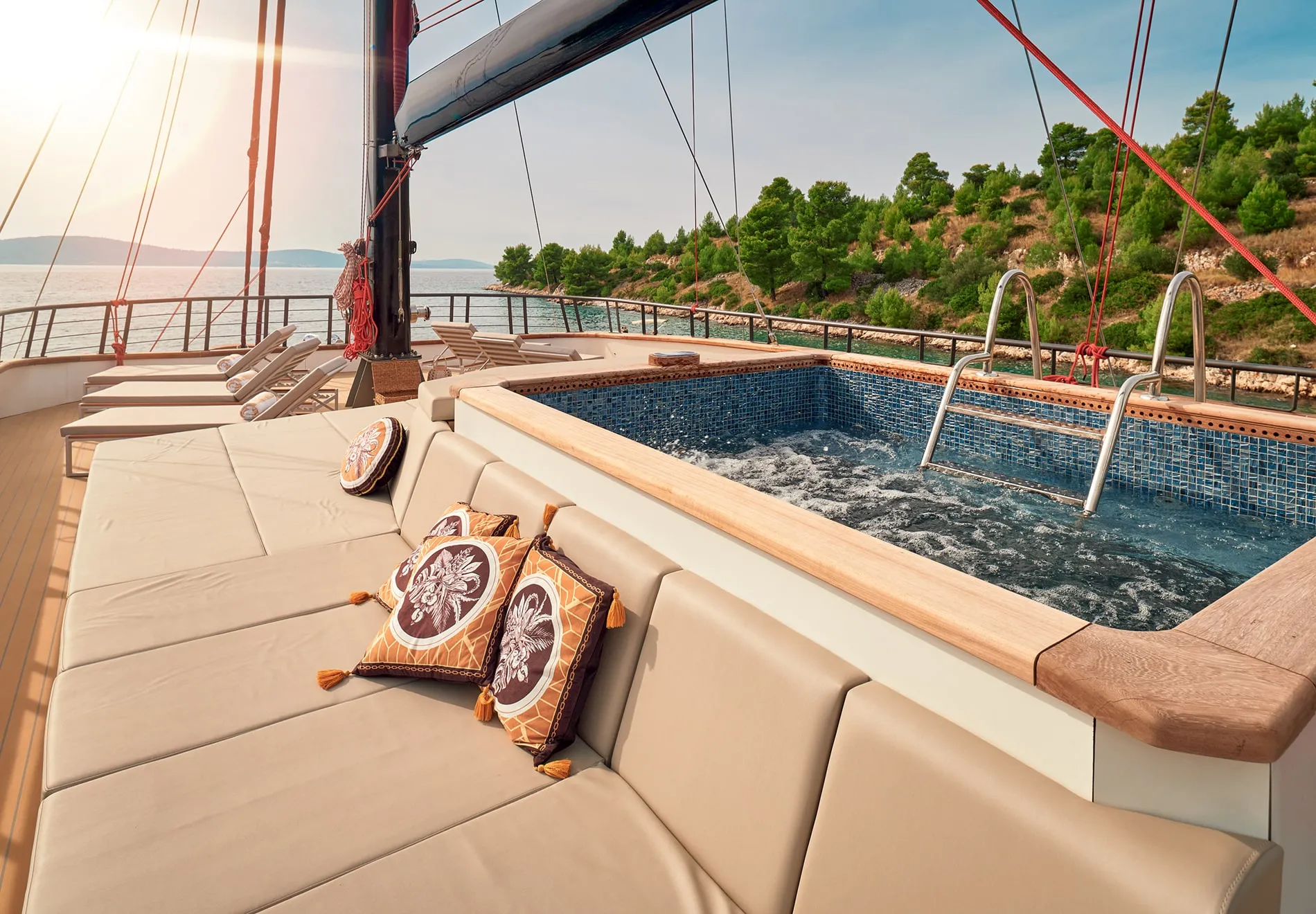 Anetta’s standout feature is the seawater pool on the aft deck, seamlessly connected to a spacious swim platform, creating an open