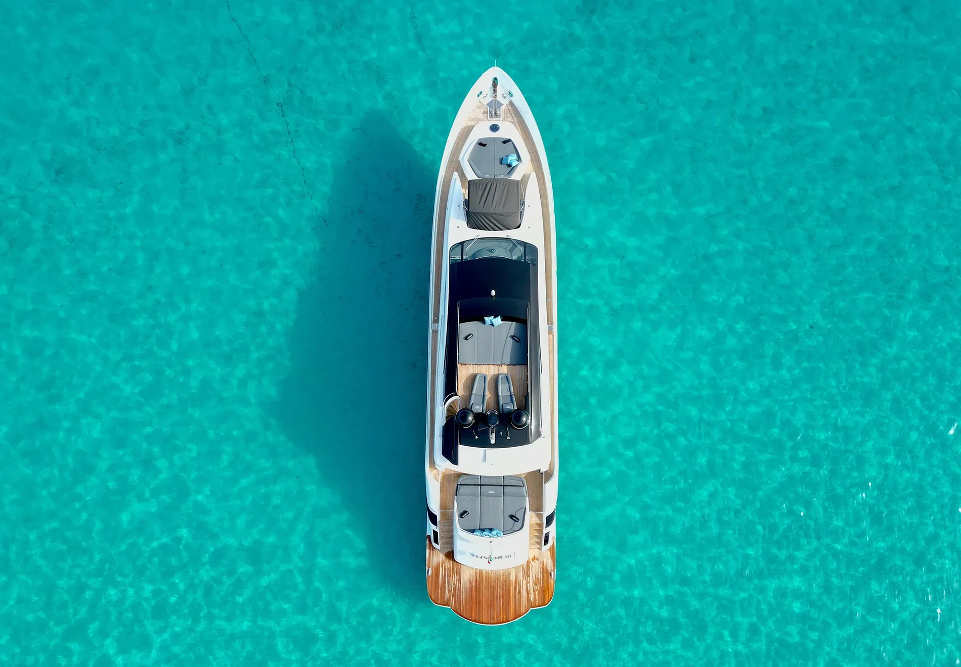 In Porto Raphael, a quaint coastal village known for its Mediterranean charm, wander through the picturesque square adorned with colorful f