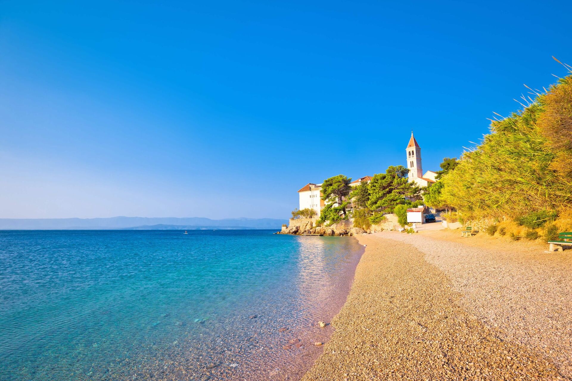 monastery on pebble beach in Bol island of Brac Dalmatia Croatia