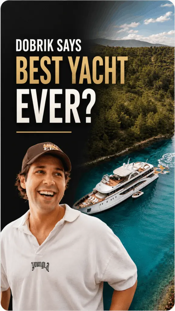 A smiling man in a white shirt and brown cap stands in front of a scenic view of a luxury yacht sailing on turquoise water near a forested coastline. Bold text reads: DOBRIK SAYS BEST YACHT EVER?.