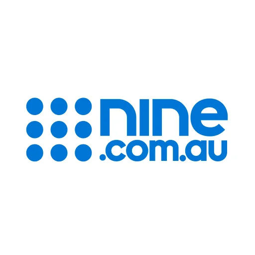Blue logo for nine.com.au features nine dots in a square on the left and the text nine.com.au in bold lowercase on the right, all on a white background.